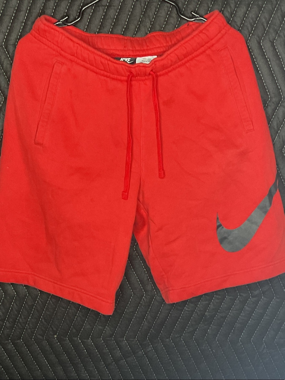 Nike Red Men's Athletic Shorts with Black Swoosh